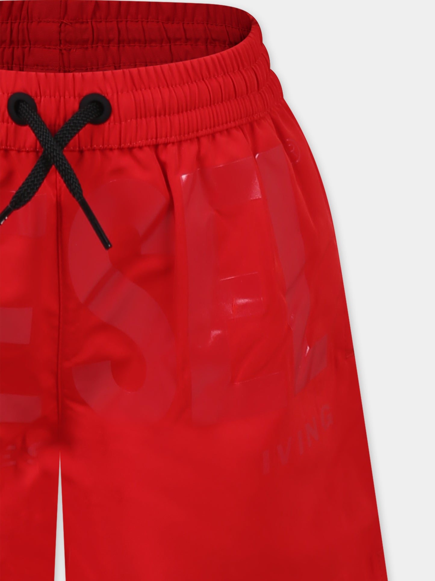 Red swim shorts for boy with logo