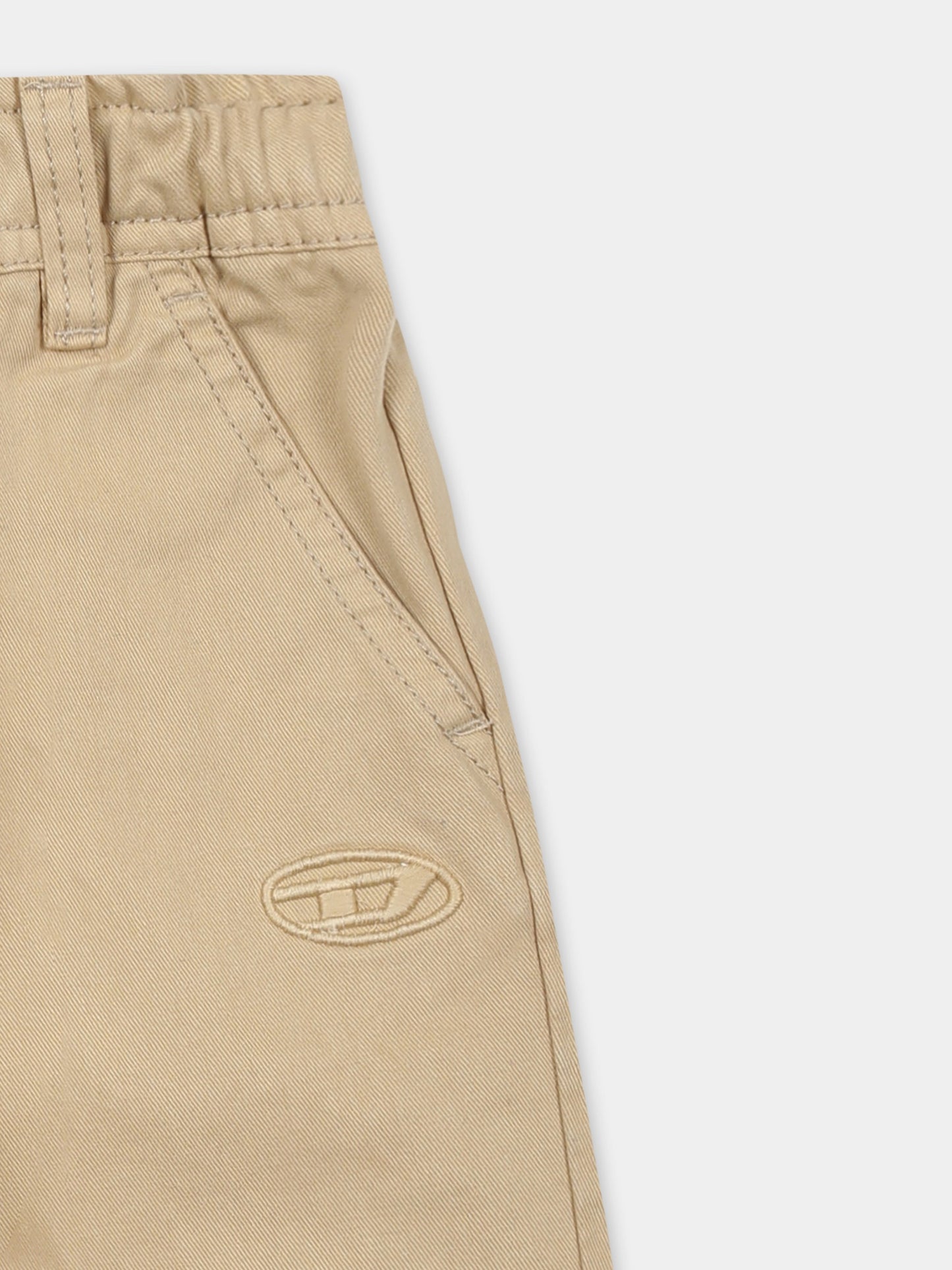 Beige trousers per neonato con logo