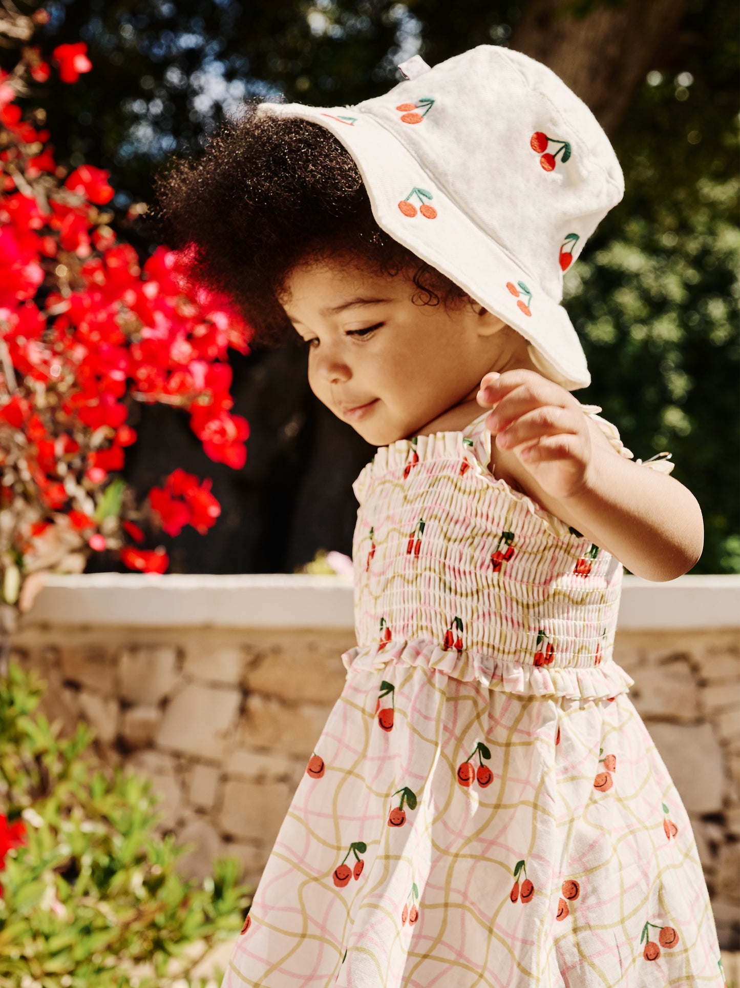 White cloche for baby girl with cherries