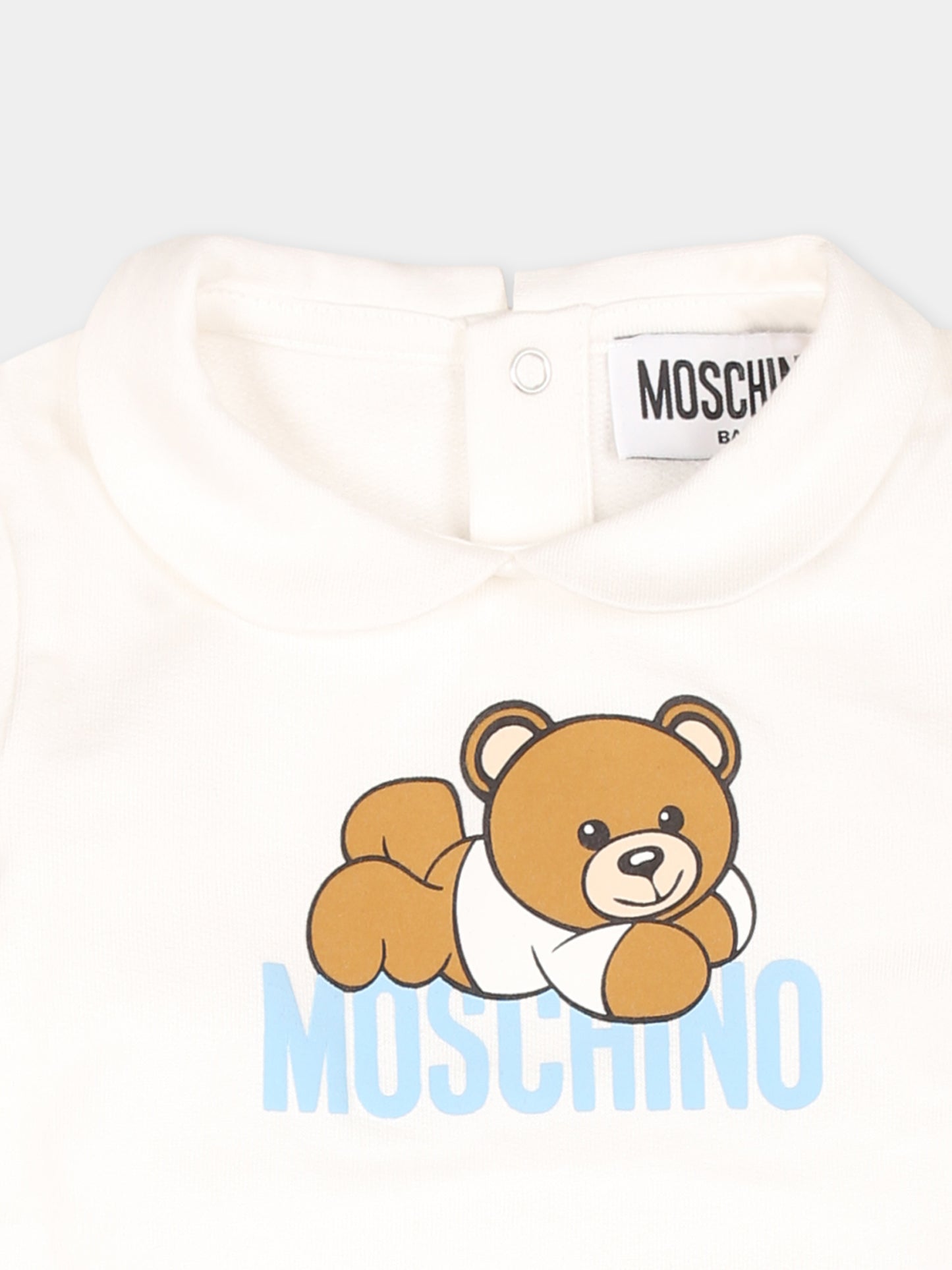 Tutina celeste per neonato con Teddy Bear sdraiato,Moschino Kids,MUY06Z LCA63 40304