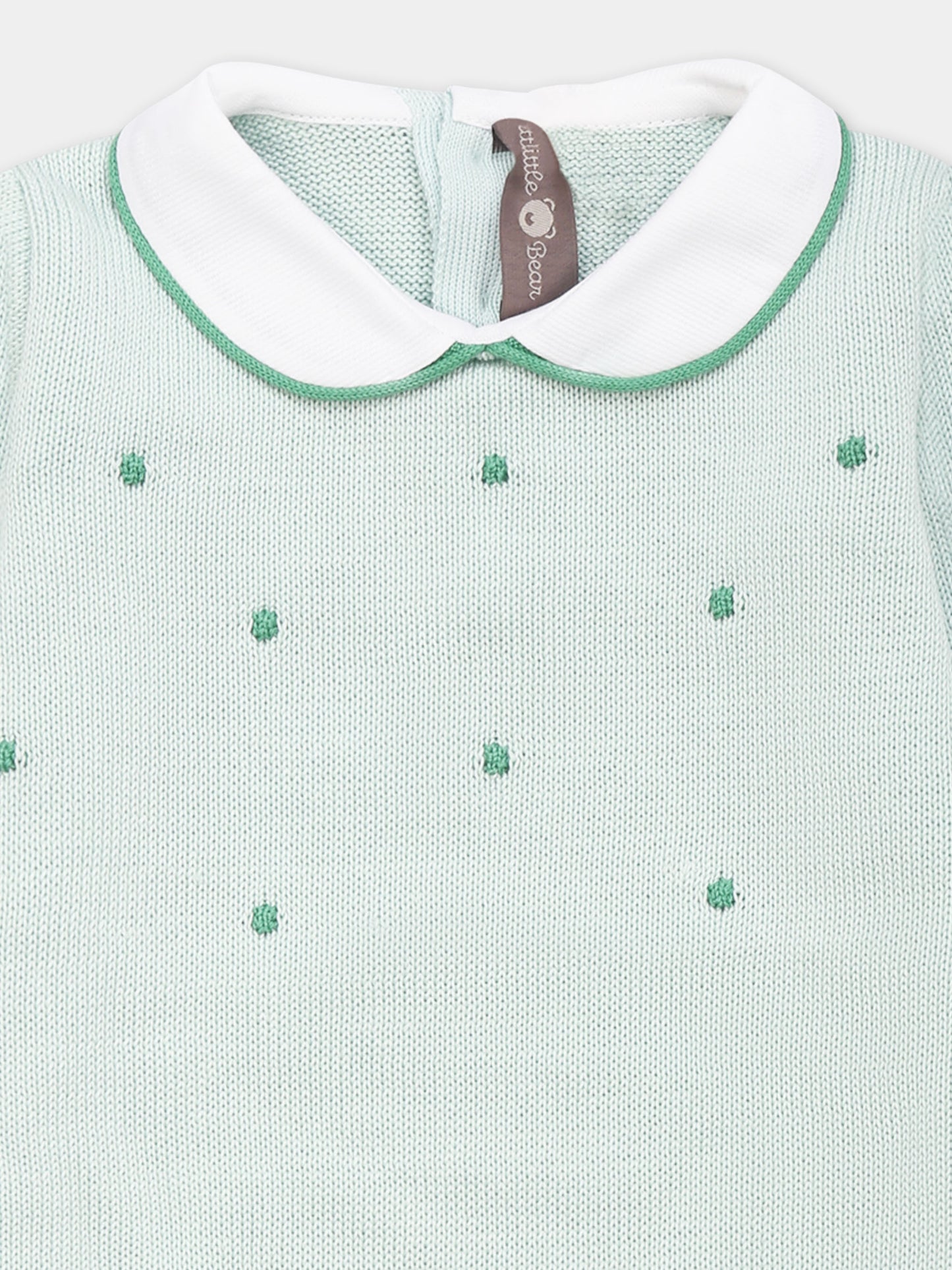 Green babygrow for babykids with polka dots